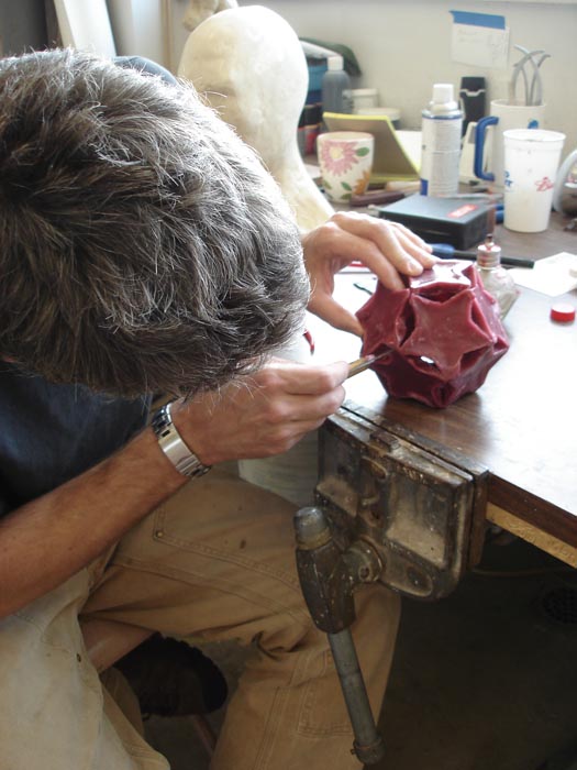 chris working the wax